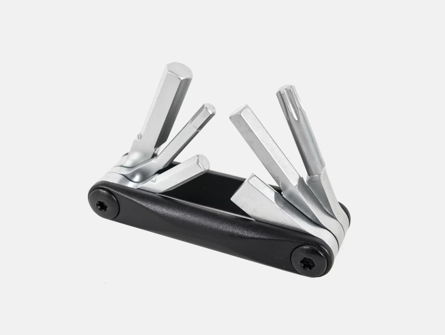 Multi-tool with multiple components on a white background
